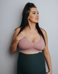 Expecting mother wearing a seamless bamboo nursing sleep bra